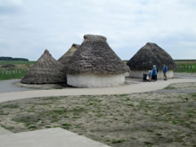 Neolithic house reconstructions at Stonehenge Visitor Centre.